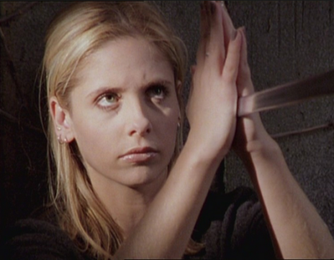 Buffy forcefully stopping Angel's sword, a turning point in her struggle for dominance. ("Becoming Part 2")