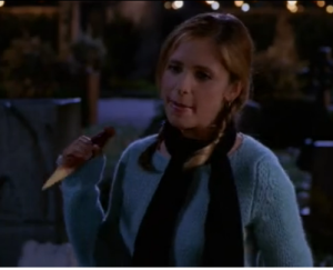 Buffy wielding her phallus, a stake that she uses to conquer her opponents with. 